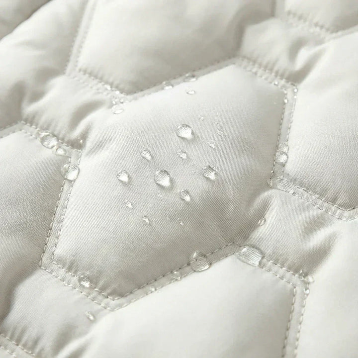 BRISEIDA | LONG MANTEAU DOUDOUNE À CAPUCHE